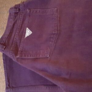 ladies plum color guess Jean's  never worn!